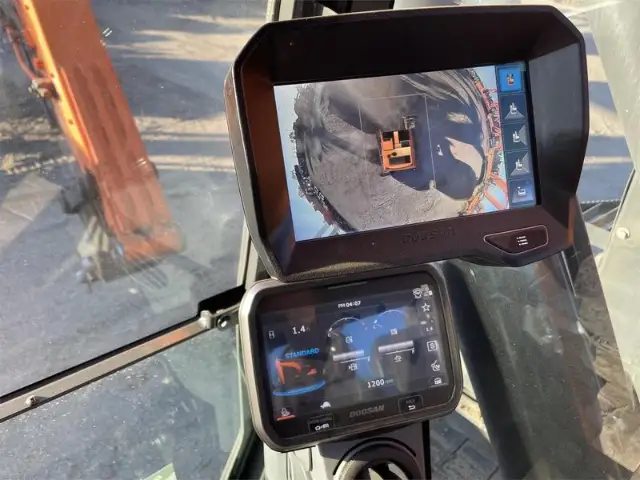 In-cab monitor showing the side and rear view cameras