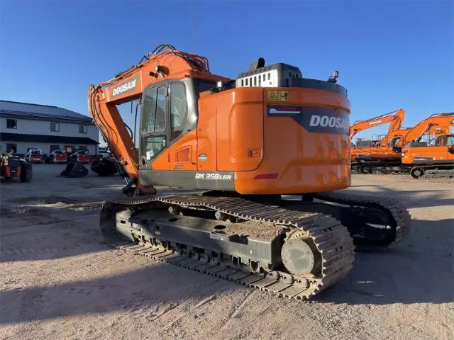 Rear quarter view showing the reduced tail swing counterweight